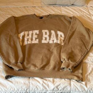 The Bar Crewneck Sweater in brown